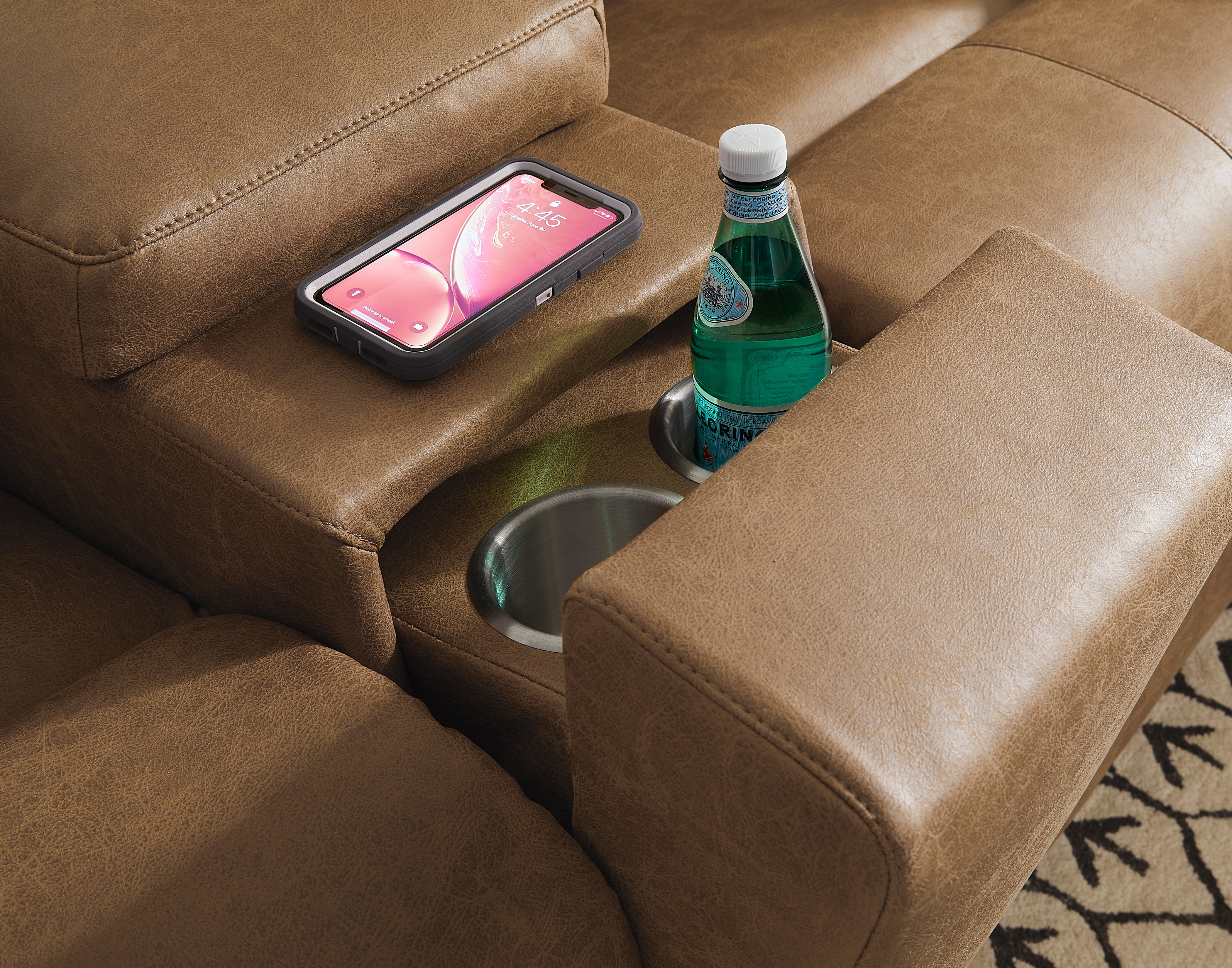 Reclining loveseat with store console cup holders